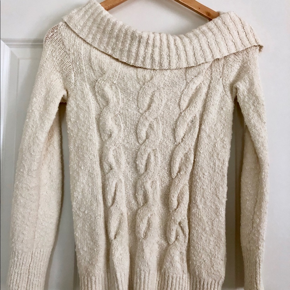 Cream - Off the shoulder sweater.